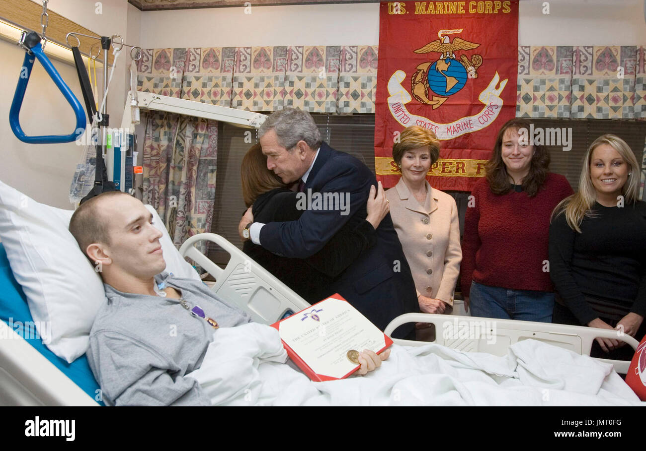 Bethesda, MD December 21, 2005 As first lady Laura Bush looks on, United States President