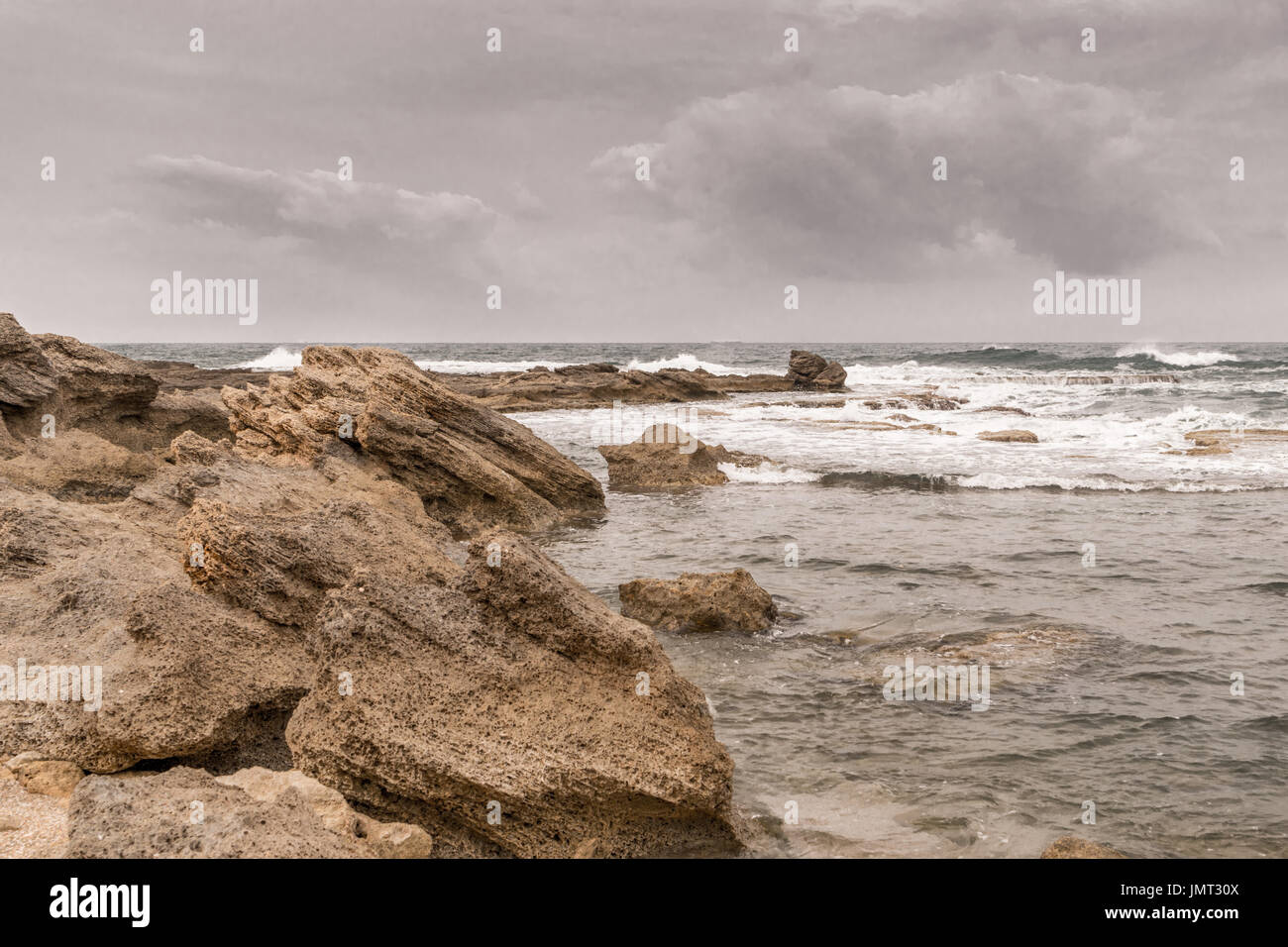 Caesarea Maritima - beach rocks closer Stock Photo