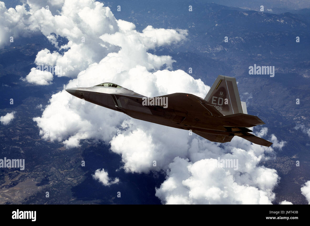An F/A-22 Raptor performs a test mission over Edwards Air Force Base ...