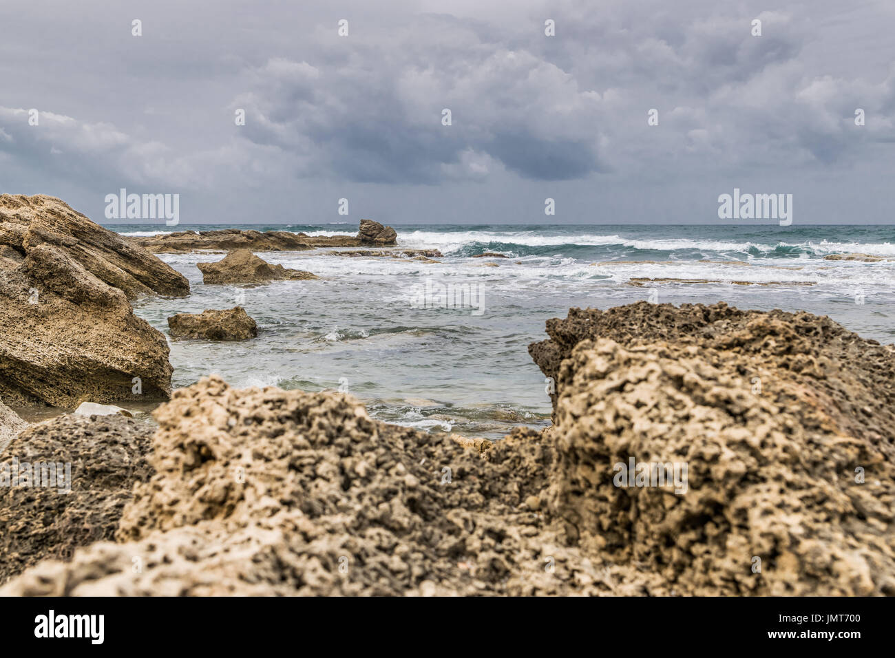 Caesarea Maritima - beach rocks Stock Photo