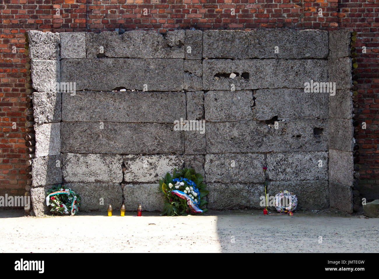 The black wall where prisoners were executed in Auschwitz concentration camp Stock Photo