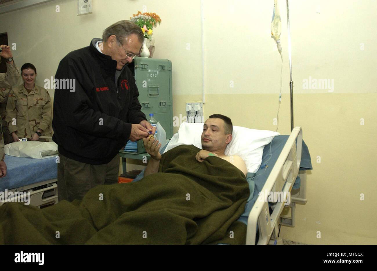 United States Secretary of Defense Donald H. Rumsfeld presents a Purple ...
