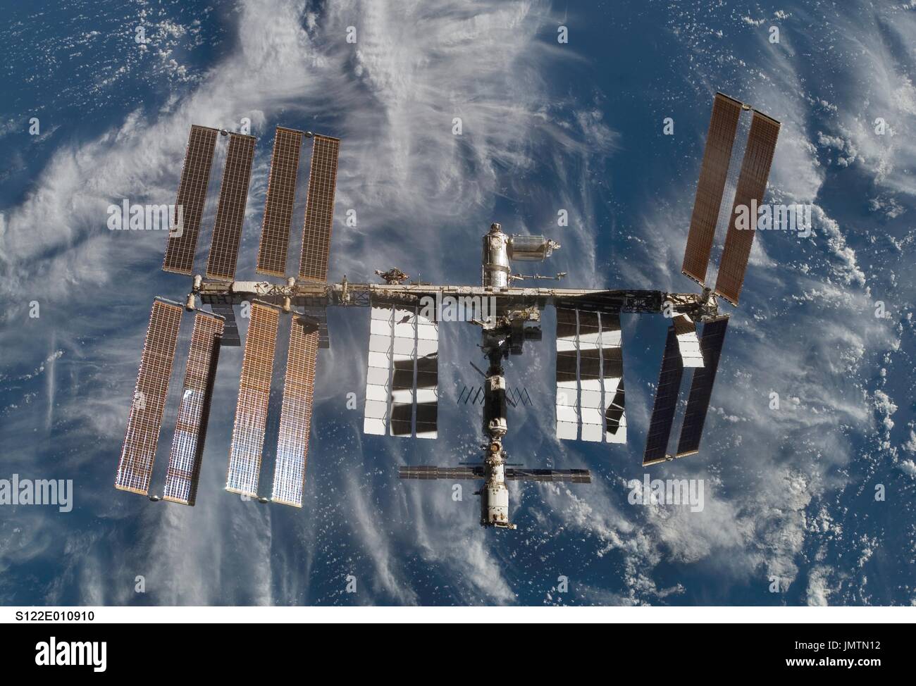 In Earth Orbit - February 18, 2008 --- Backdropped by a blue and white ...