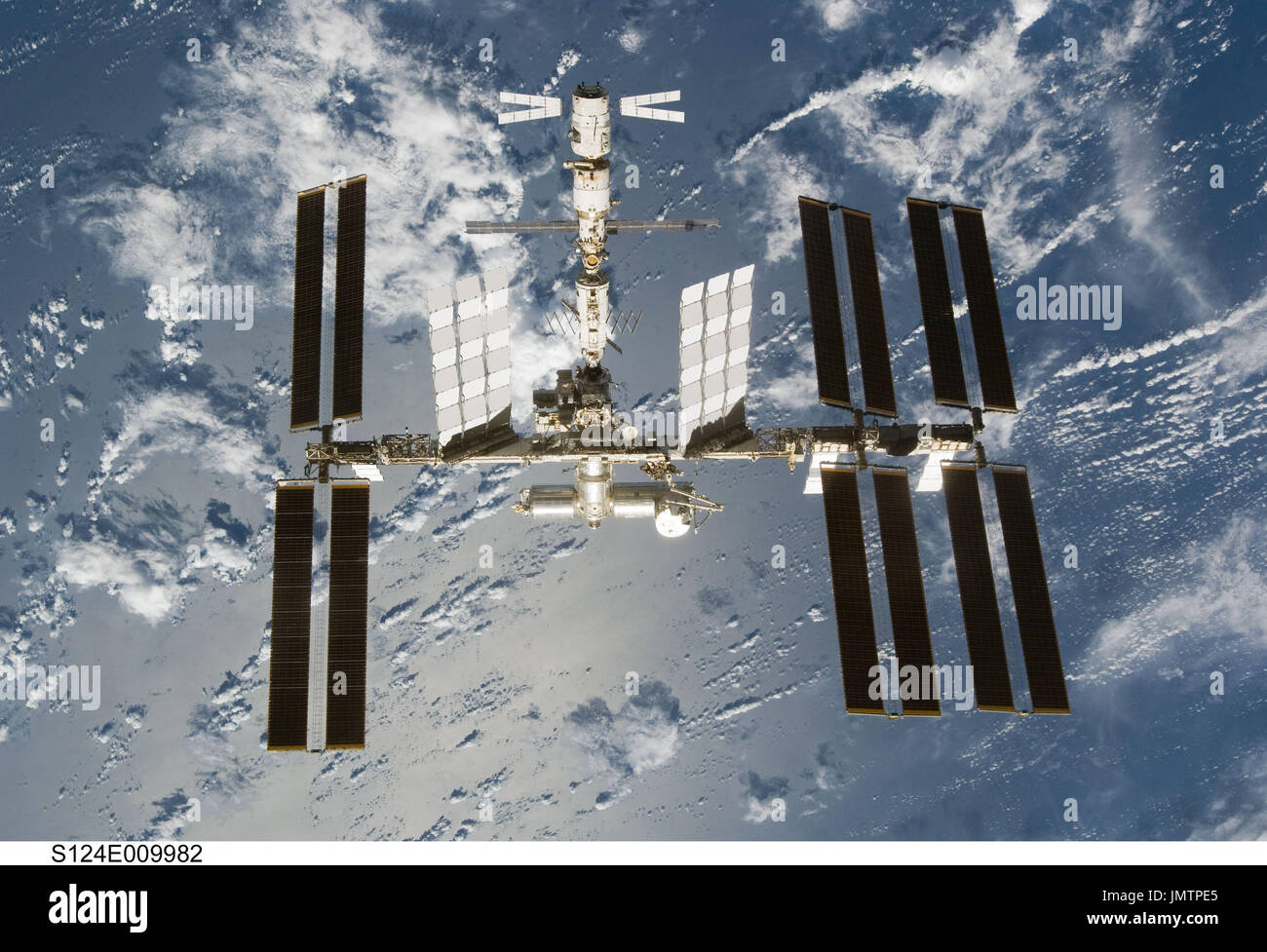 In Earth Orbit - June 11, 2008 -- Backdropped by a blue and white part ...