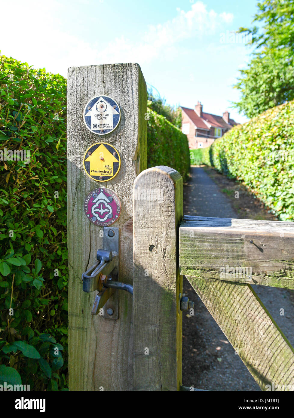 A wooden footpath sign post saying 'two saints way' at Acton, Cheshire, England, UK Stock Photo