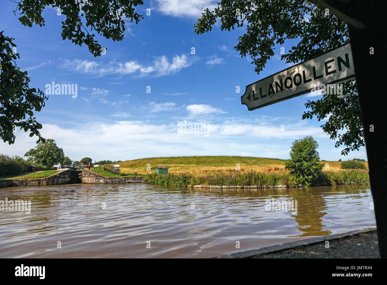 A sign post pointing to Llangollen at Hurleston Junction at the start of the Llangollen Canal Cheshire England UK Stock Photo