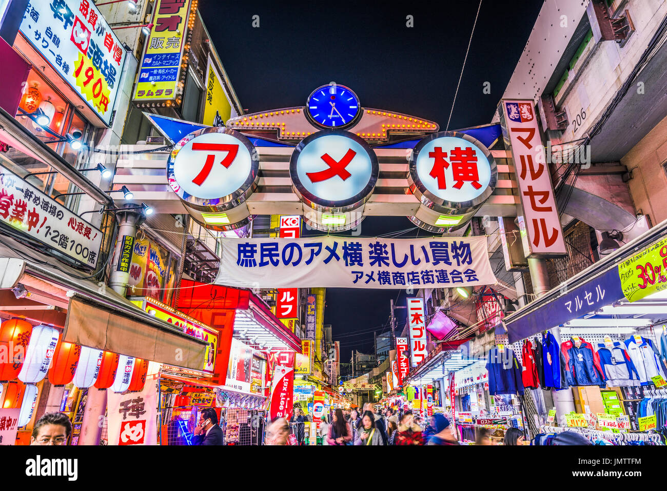 TOKYO, JAPAN - DECEMBER 28, 2015: Crowds at Ameyoko shopping district of Tokyo. The street was the site of a black market in the years following World Stock Photo
