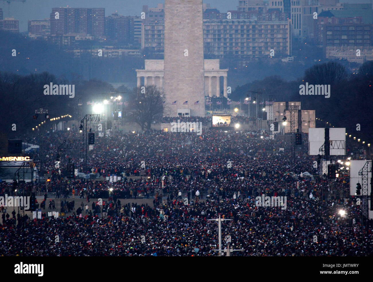Washington, DC - January 20, 2009 -- People fill the National Mall in the early morning hours of Tuesday, January 20, 2009, as they wait for the Inauguration of Barack Obama as the 44th President of the United States..Credit: Scott Andrews - Pool via CNP Stock Photo