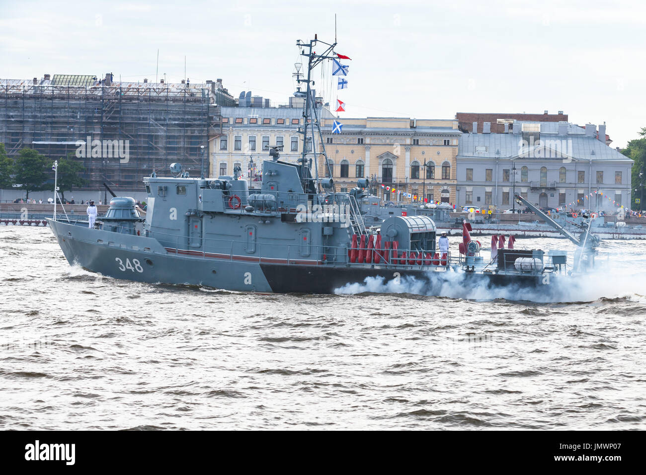 Saint-Petersburg, Russia - July 28, 2017: Warship goes on the Neva River. Rehearsal for the parade of Russian naval forces. Tugboat of the Navy RB-348 Stock Photo