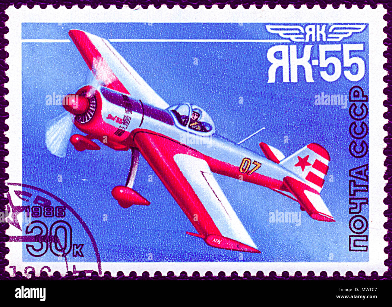 SOVIET UNION - CIRCA 1986: Postage stamp printed in Soviet Union shows vintage airplane YAK-55. Stamp printed by Russian Post circa 1986. Stock Photo