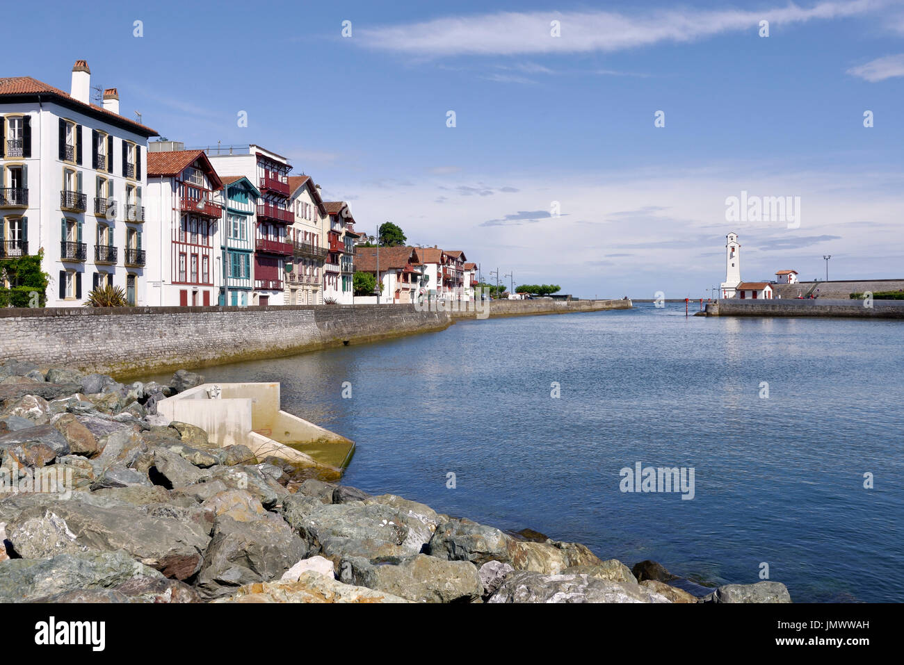 Entrance channel of port of Cibourre and Saint-Jean-de-Luz with the lighthouse, communes in the Pyrénées-Atlantiques department in France Stock Photo