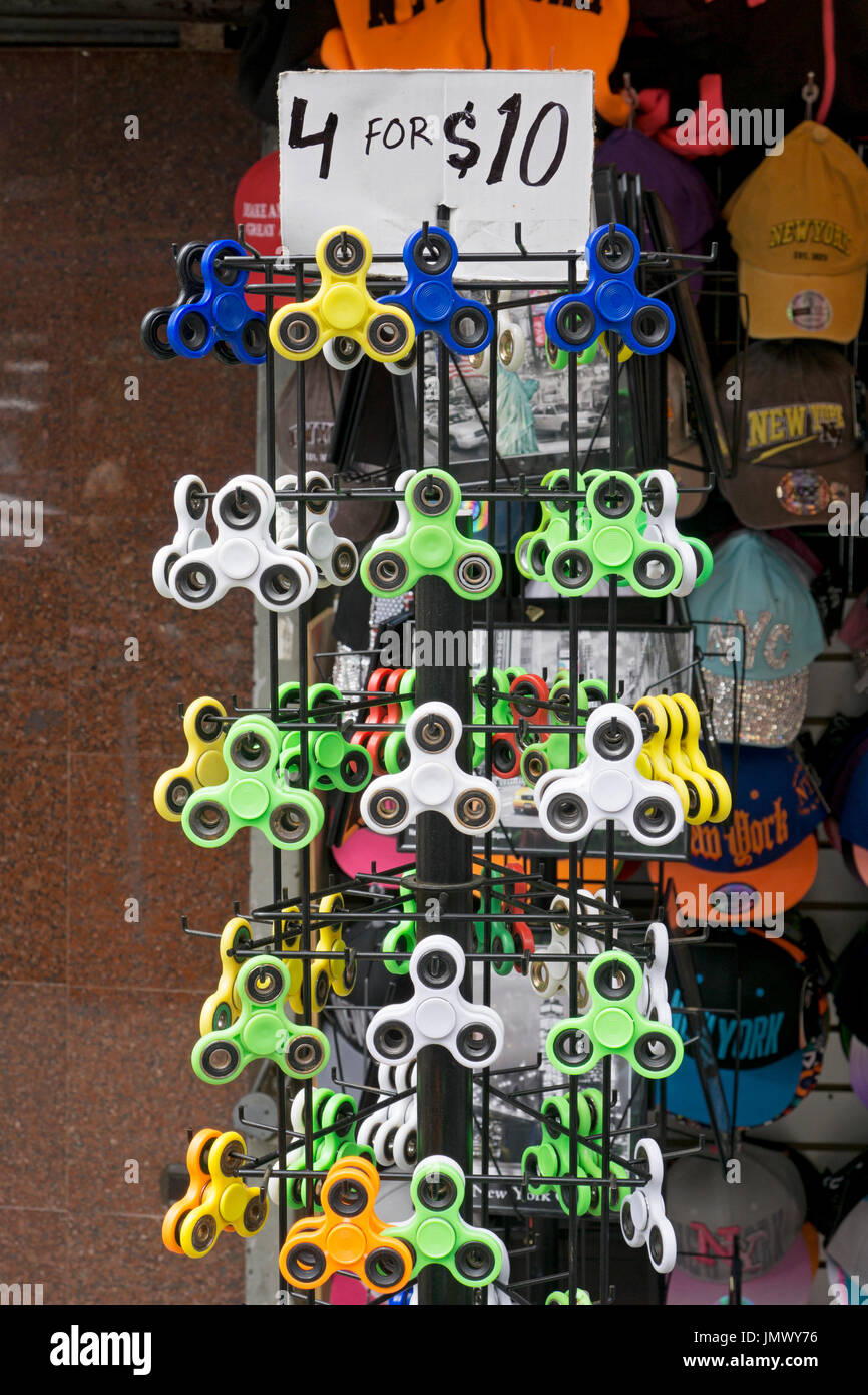 A stand on Mulberry Street in Little Italy selling low priced fidget spinners, mostly to tourists. In New York City. Stock Photo