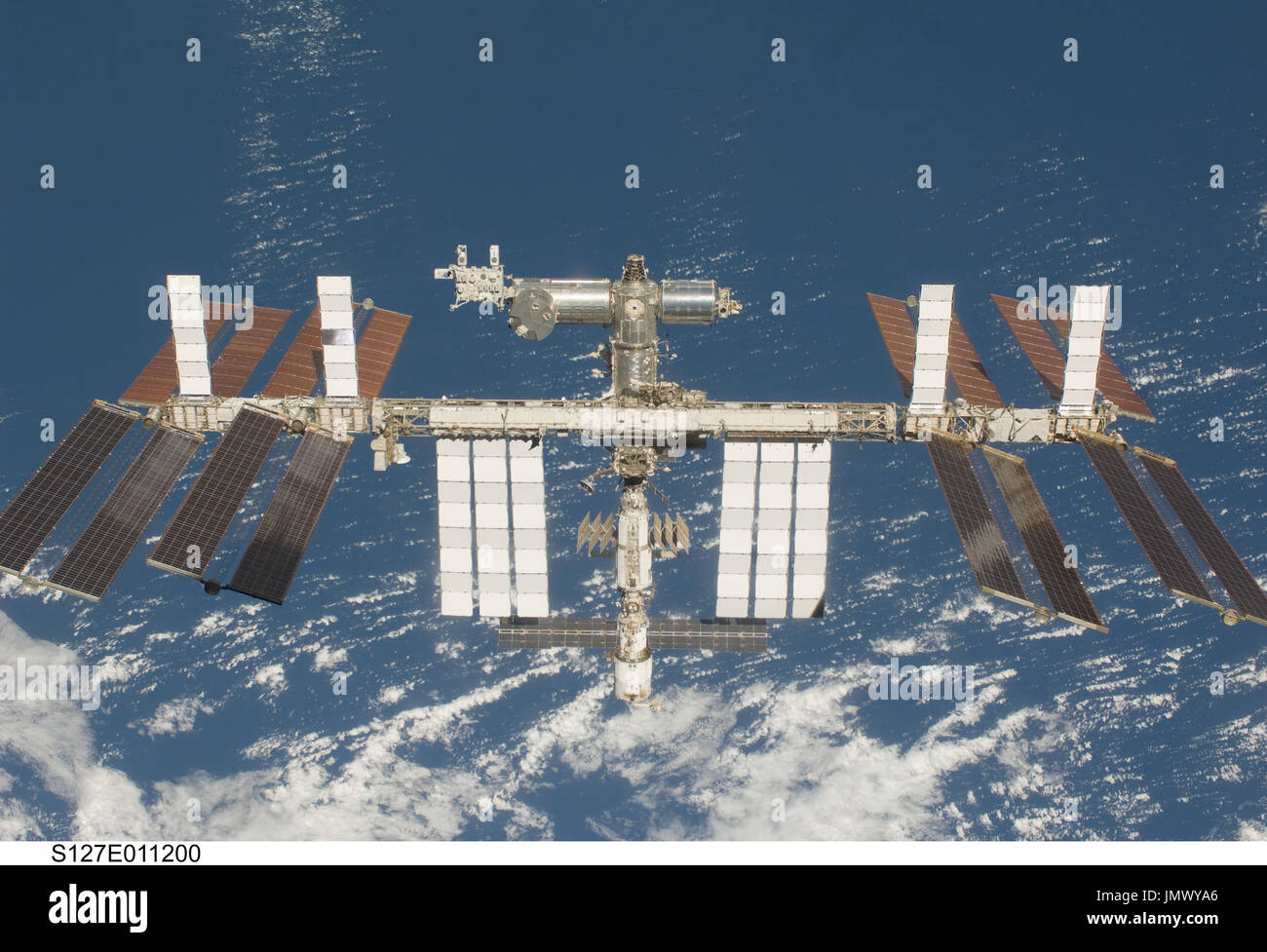 In Earth Orbit - July 28, 2009 -- Backdropped by a blue and white Earth ...