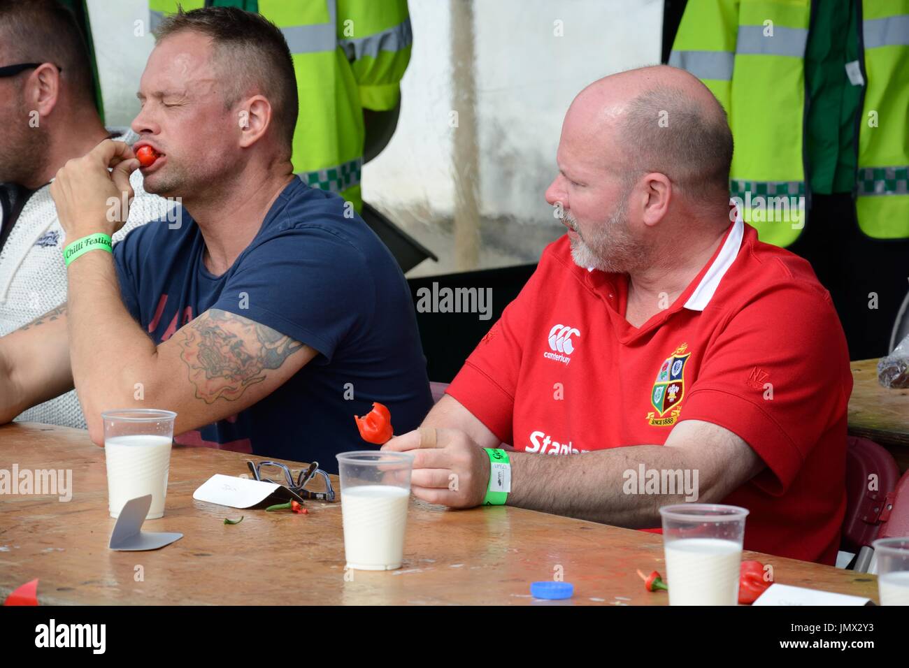 Contestants eating chilli at a chilli festival Gower Chilli Festival Glamorgan Wales Cymru UK GB Stock Photo