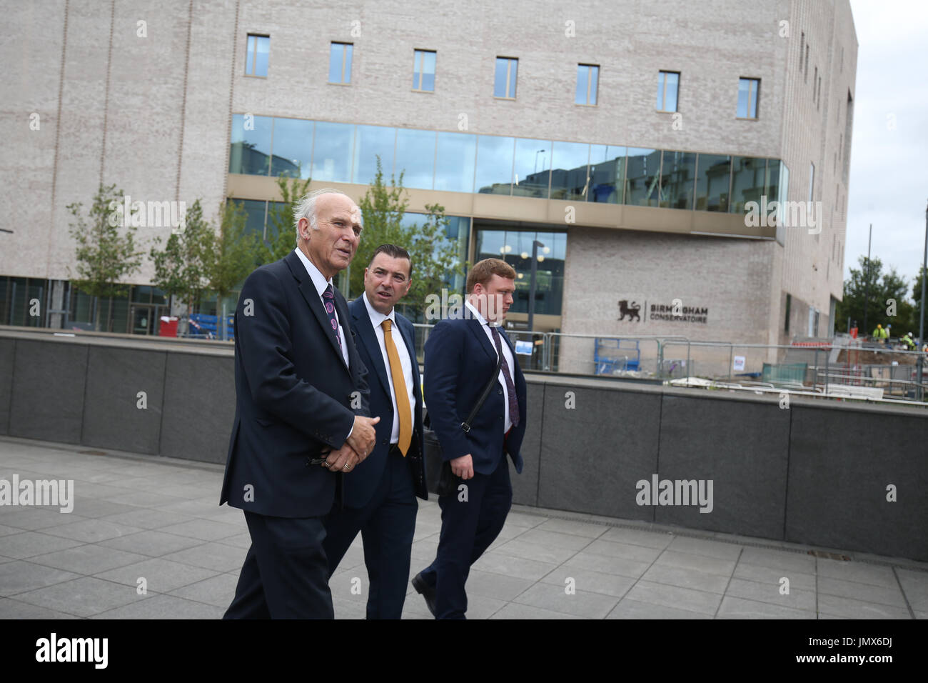 Liberal Democrats leader Sir Vince Cable (left) with Julian Beer, vice chancellor of Birmingham City University (centre) during a tour of the university after speaking at the university's Centre for Brexit Studies. Stock Photo