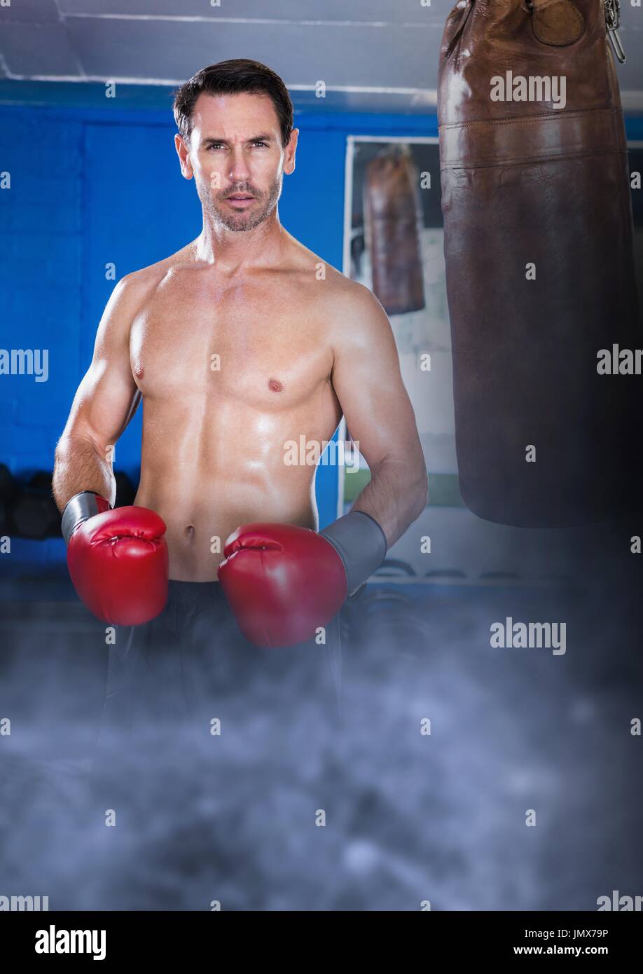 Digital composite of Boxer fighter man with transition and punch bag Stock  Photo - Alamy