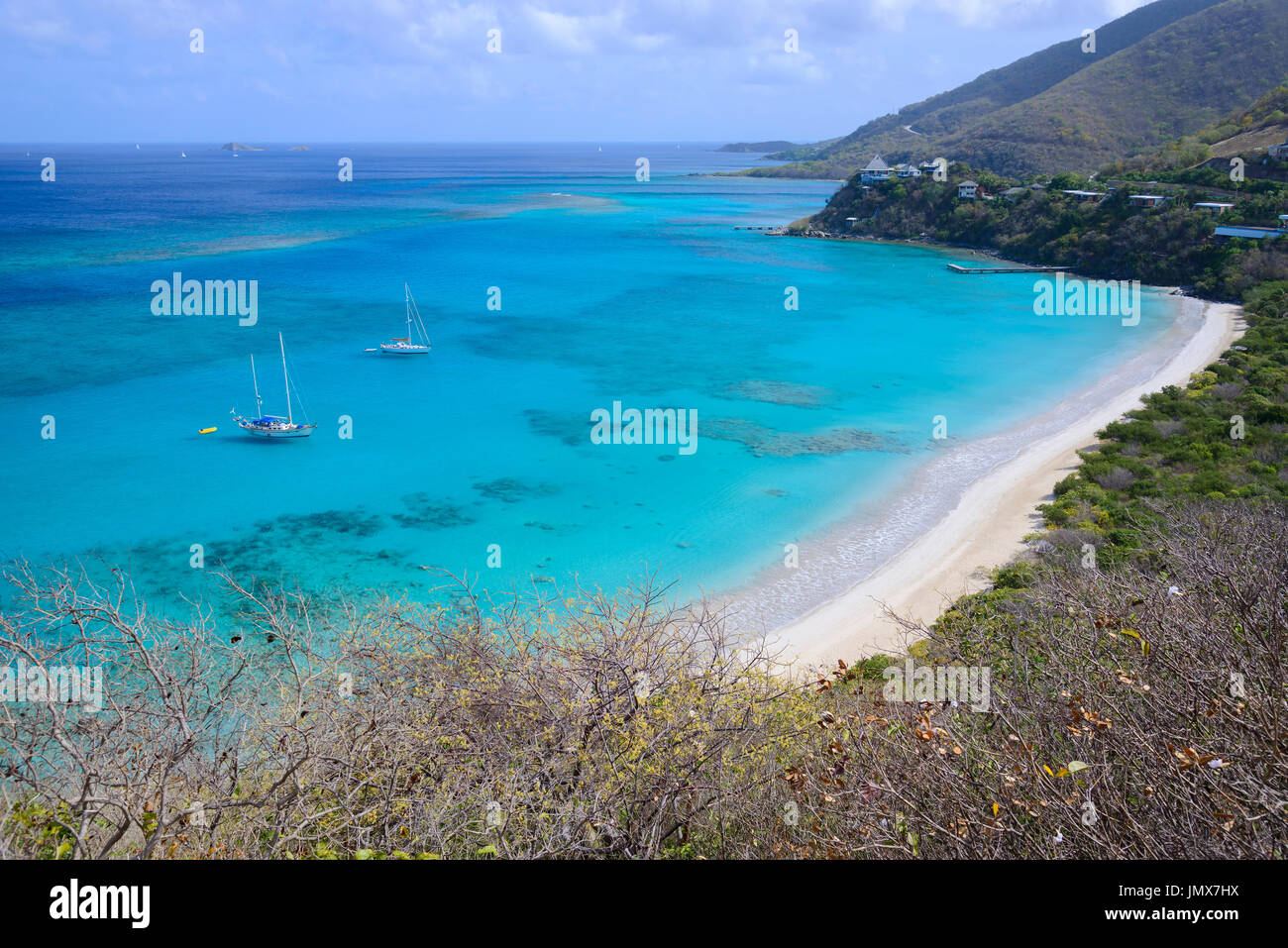 Sandy Beach of Savannah Bay with vegetation on hill, Savannah Bay, British Virgin Islands, Caribbean Sea Stock Photo