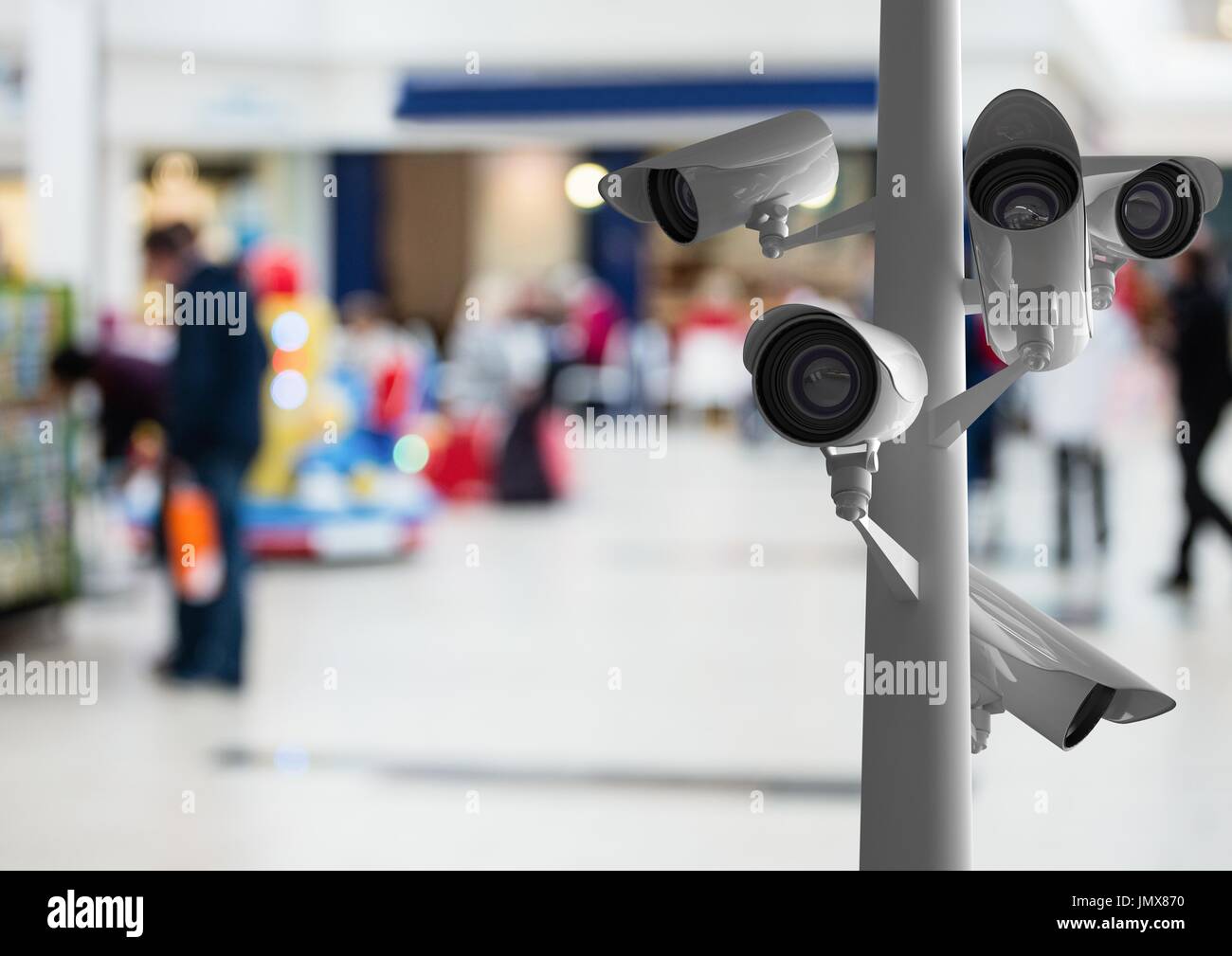 Digital composite of CCTV cameras against defocused background Stock Photo