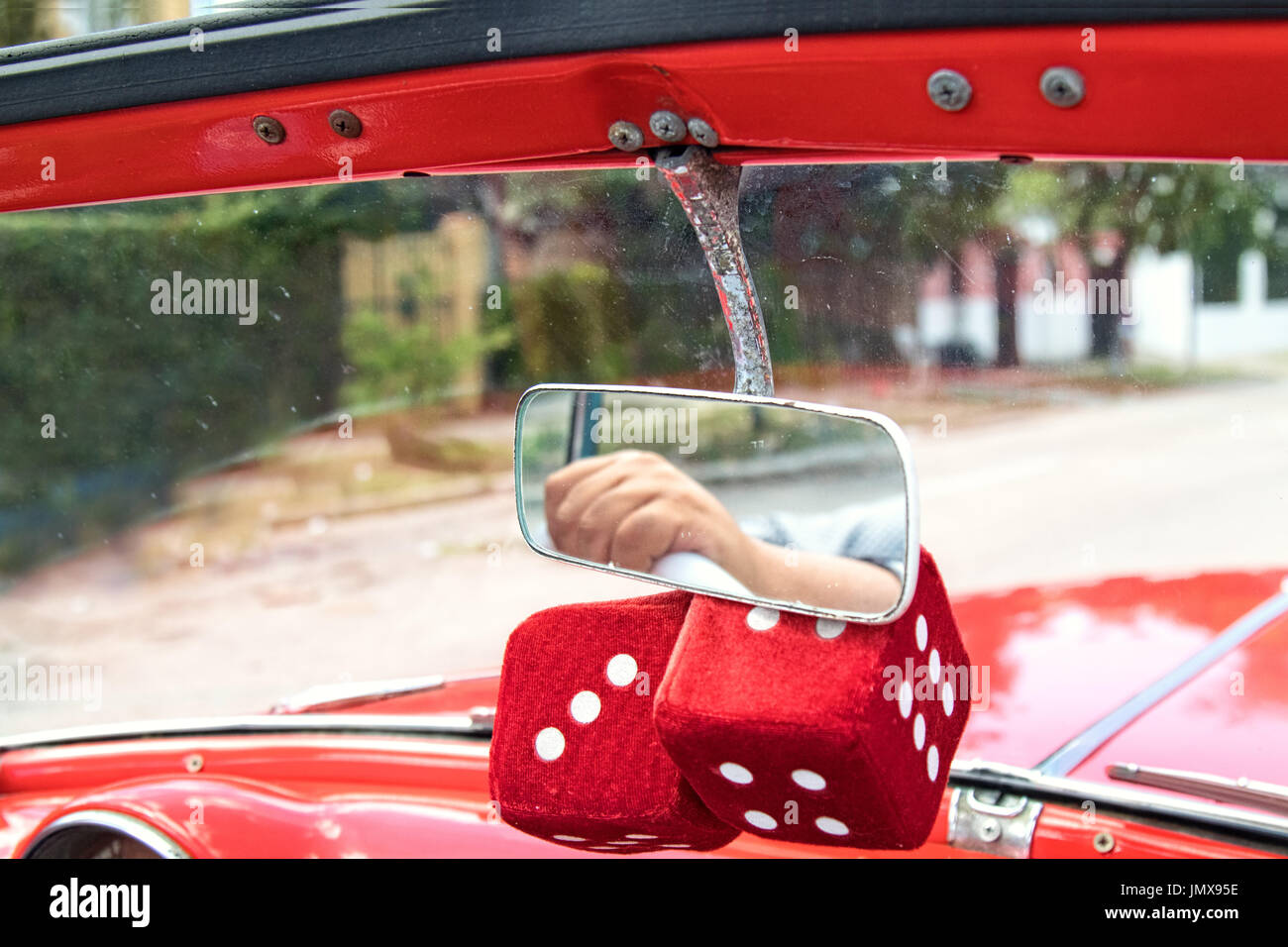 Dice hanging in car hi-res stock photography and images - Alamy