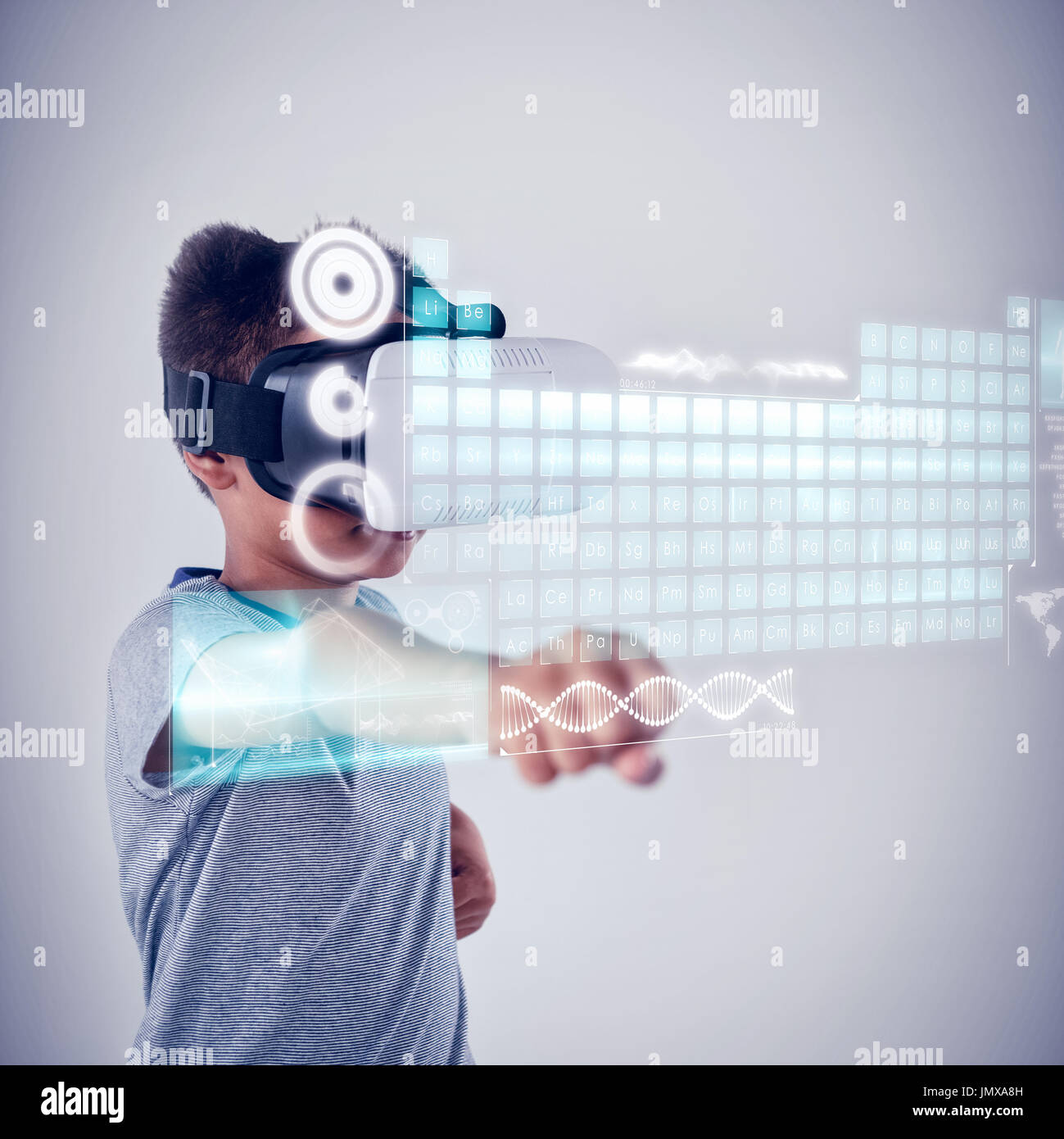 Keyboard interface against schoolboy using virtual reality headset Stock Photo