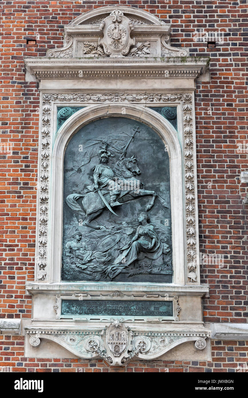 King John III Sobieski bas relief on St. Mary Church outdoor wall built in 1883. Krakow, Poland. Stock Photo