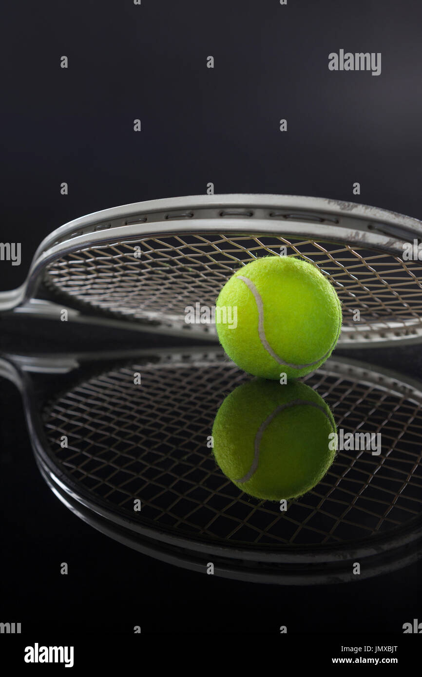 Premium Photo  Close up of tennis ball on string or net of tennis racquet  for exercise and hobby