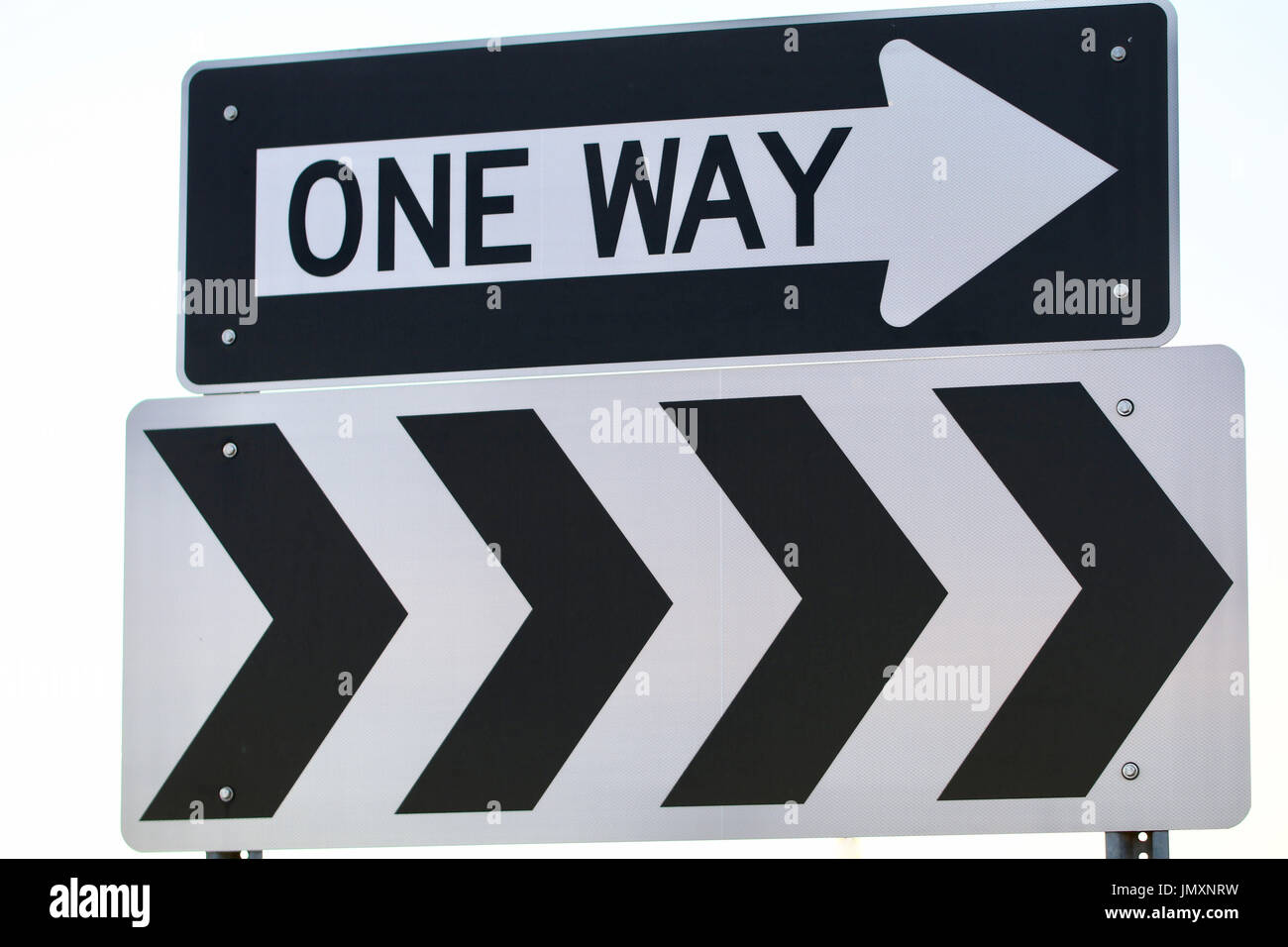One way sign with arrows Stock Photo
