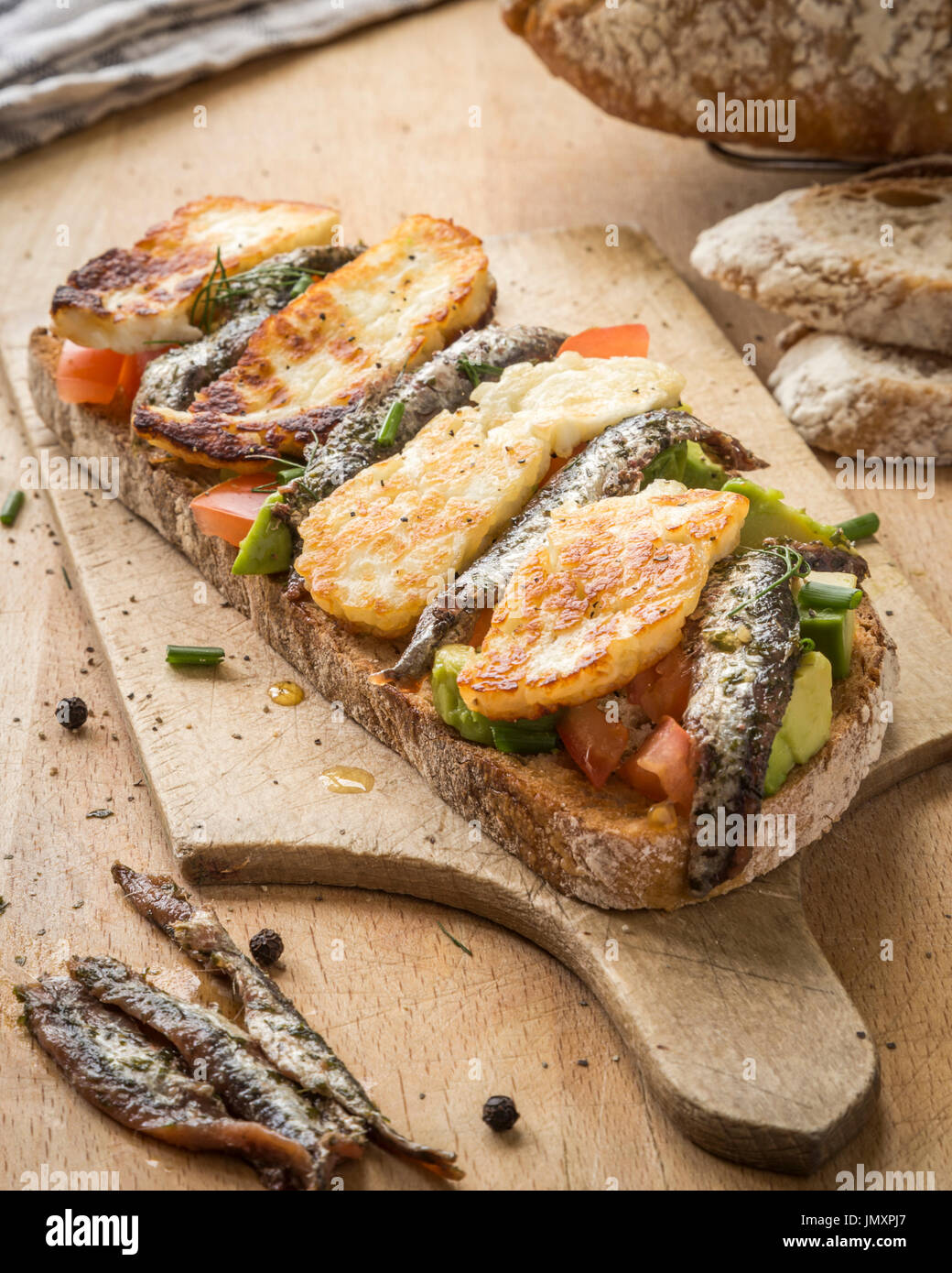 Toasted sourdough bread with Tomato, Avocado Stock Photo Alamy