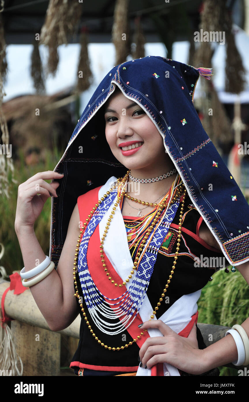 Smiling Kadazan Dusun girl in traditional costume Stock Photo