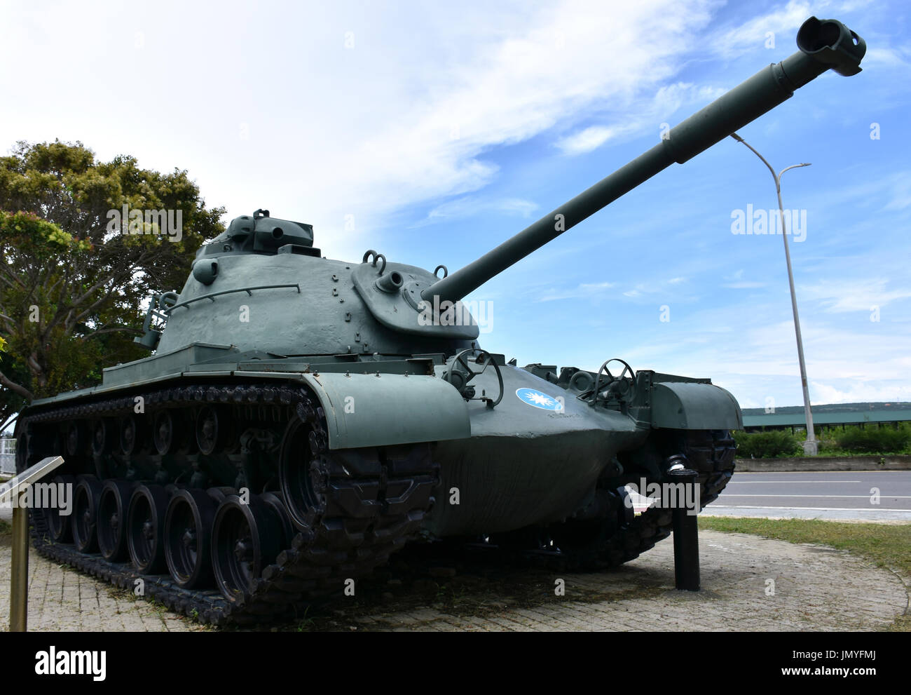 Old WWII tank in Taiwan on display in center of town along road, south Taiwan. Stock Photo