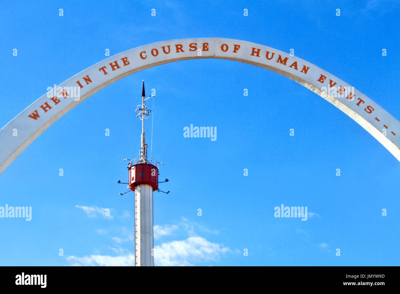 The Oklahoma State Fair Park arch and Space Tower stand against a blue sky.  The arch was destroyed in heavy storms. Stock Photo