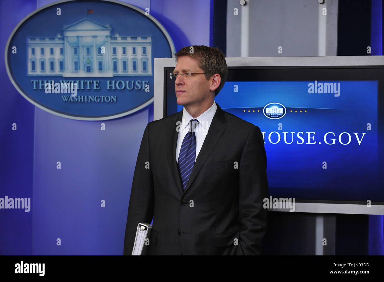 White House Press Secretary Jay Carney looks on as United States ...