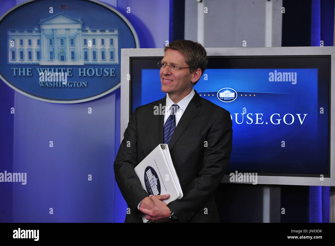 White House Press Secretary Jay Carney looks on as United States ...