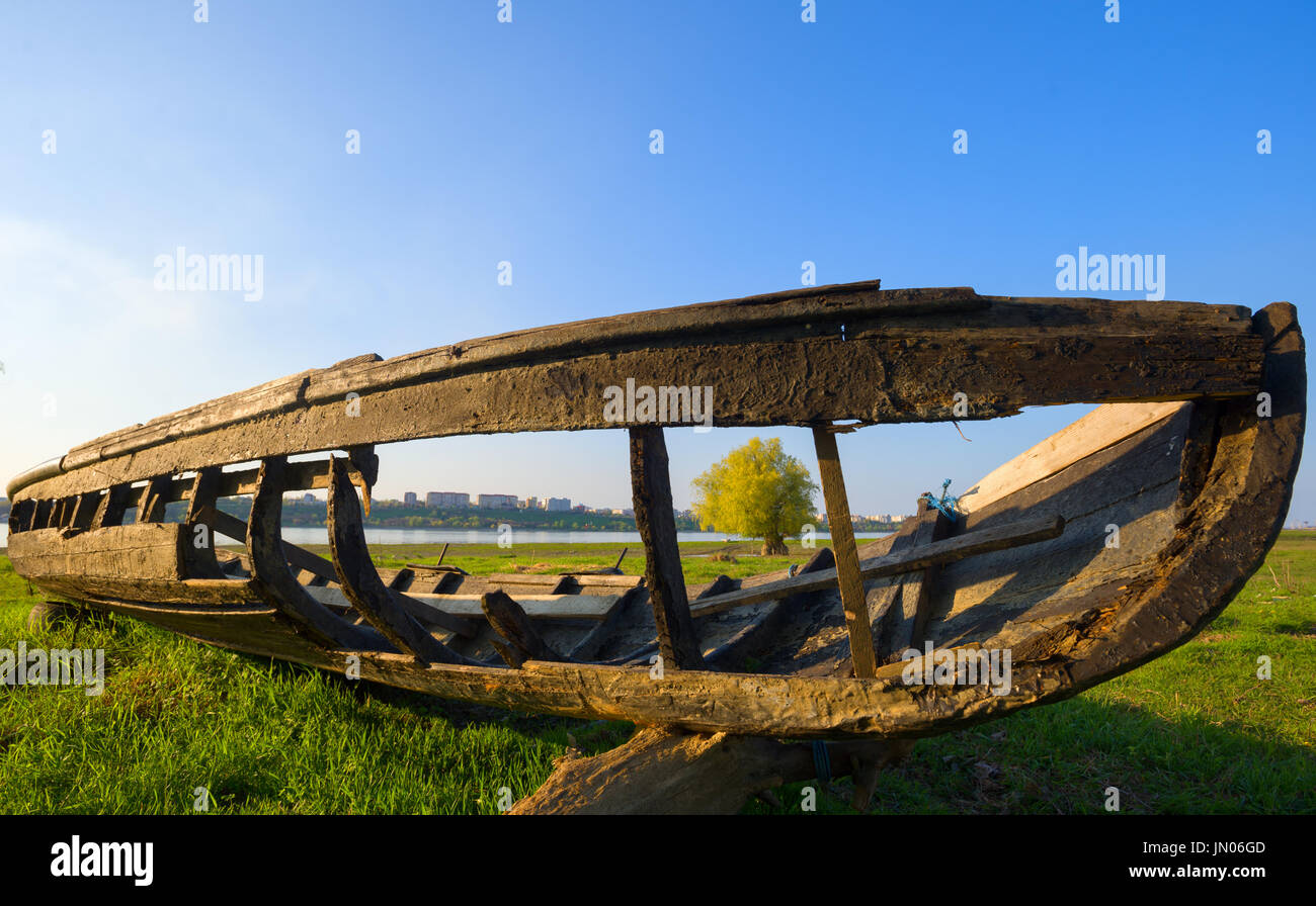 old wooden boat on shore Stock Photo - Alamy