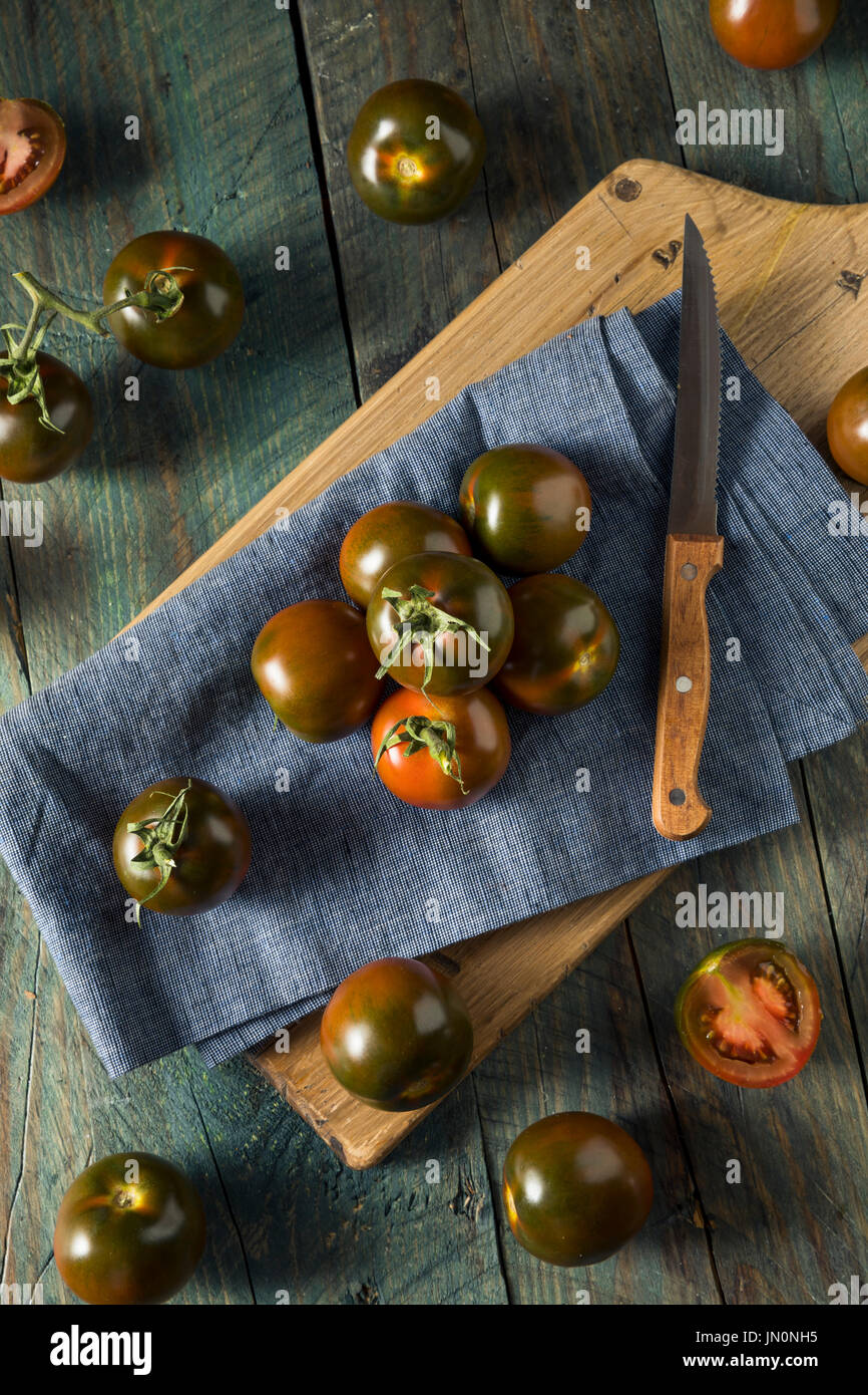 Raw Organic Brown Kumato Tomatoes Ready to Eat Stock Photo Alamy