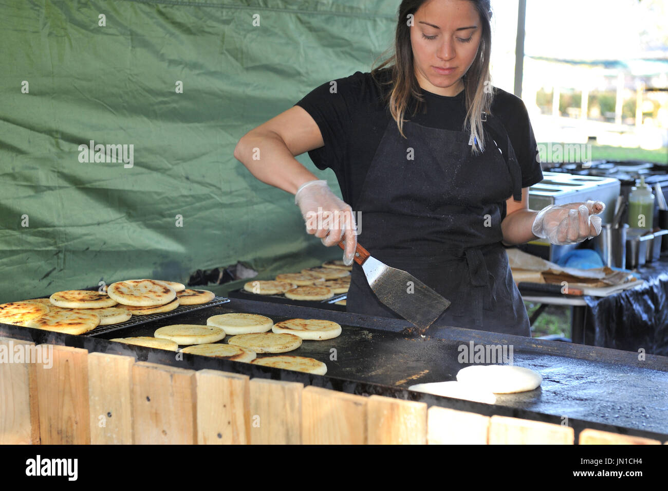 Bankstown. New South Wales. AUSTRALIA. 29th July 2017. Stallholder cooking buns at Bankstown Bites Festival 2017 29th July 2017. Stock Photo