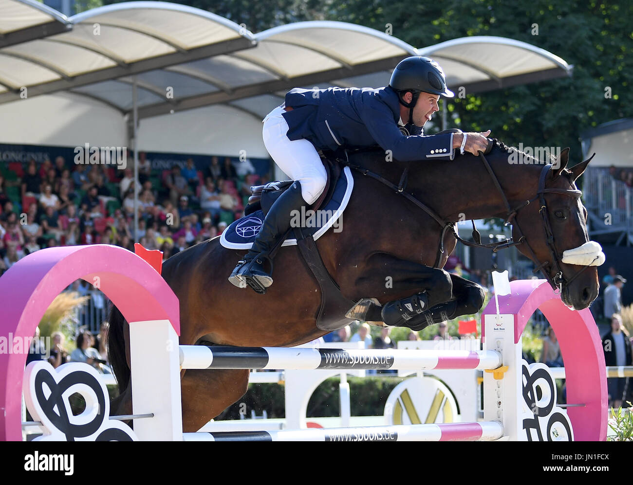 Berlin, Germany. 28th July, 2017. Show jumper Jack Towell in action on his horse Emilie de Diamant during the AG-DVAG sponsored event at the Global Champions Tour in Berlin, Germany, 28 July 2017. This year's show jumping competition opened on the 28 July and will run through to the 30 July 2017. Photo: Britta Pedersen/dpa-Zentralbild/ZB/dpa/Alamy Live News Stock Photo