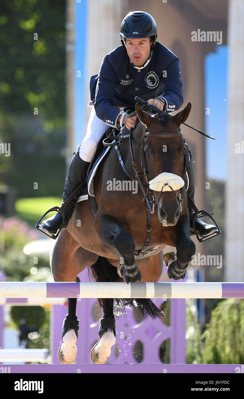 Berlin, Germany. 28th July, 2017. Show jumper Jack Towell in action on his horse Emilie de Diamant during the AG-DVAG sponsored event at the Global Champions Tour in Berlin, Germany, 28 July 2017. This year's show jumping competition opened on the 28 July and will run through to the 30 July 2017. Photo: Britta Pedersen/dpa-Zentralbild/ZB/dpa/Alamy Live News Stock Photo