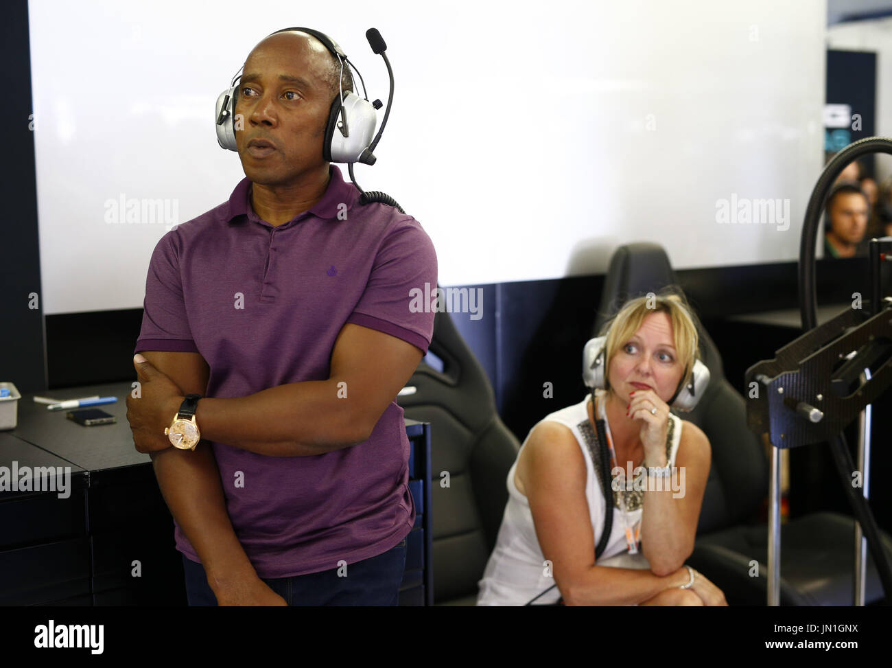 Budapest, Hungary. 29th July, 2017. Motorsports: FIA Formula One World Championship 2017, Grand Prix of Hungary, Anthony Hamilton, father of #44 Lewis Hamilton (GBR, Mercedes AMG Petronas F1 Team), with Linda Hamilton 29.07.2017. | usage worldwide Credit: dpa/Alamy Live News Stock Photo