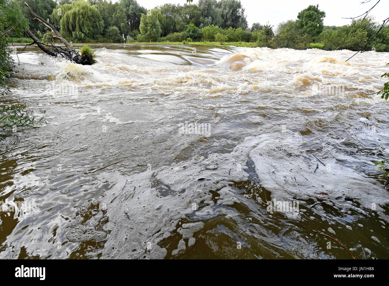 A strong current causes whitewater in the swollen Leine river in Neustadt am Ruebenberge