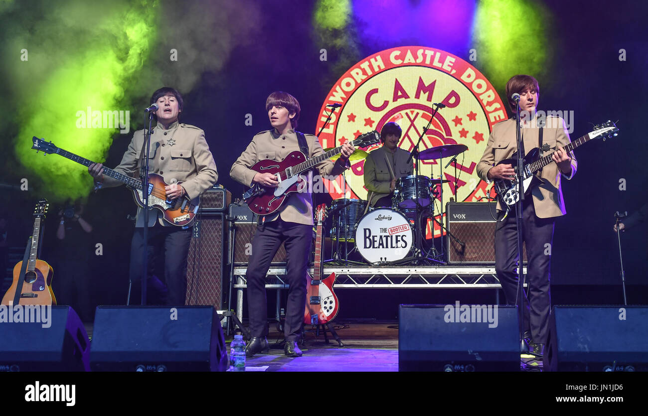 Lulworth Castle, Dorset, UK. 29th July, 2017. The Bootleg Beatles  perform  on the Castle Stage at Camp Bestival 2017, Saturday, Lulworth Castle, Dorset, YK Credit: jules annan/Alamy Live News Stock Photo