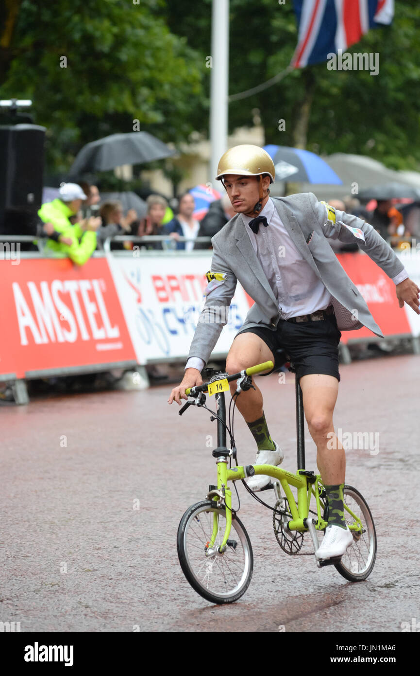 London, UK. 29th July, 2017. The 2017 Brompton World Championships. Cyclist competed in the race starting with unfolding the Brompton folding bicycles. The cyclists could only enter on a Brompton bike and could not wear lycra. Some competitors wore costumes for the race. The winner of the race.  Andrew Steven Graham/Alamy Live News Stock Photo