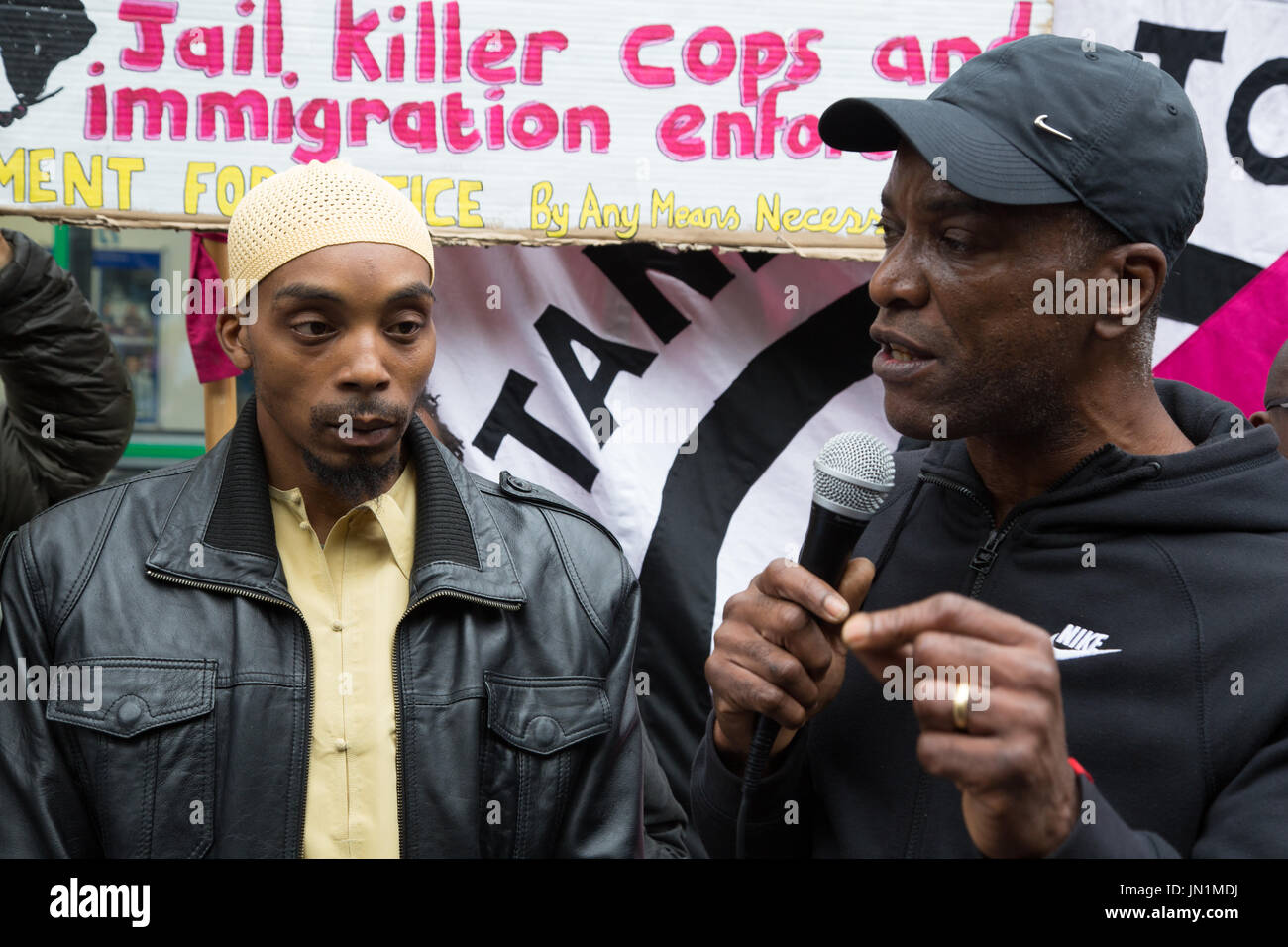 London, UK. 29th July, 2017. Stafford Scott (R) speaks on behalf of Mr Charles(L) father of Rashan Charles who died after being followed by police into a convenience store in east London. Credit: Thabo Jaiyesimi/Alamy Live News Stock Photo