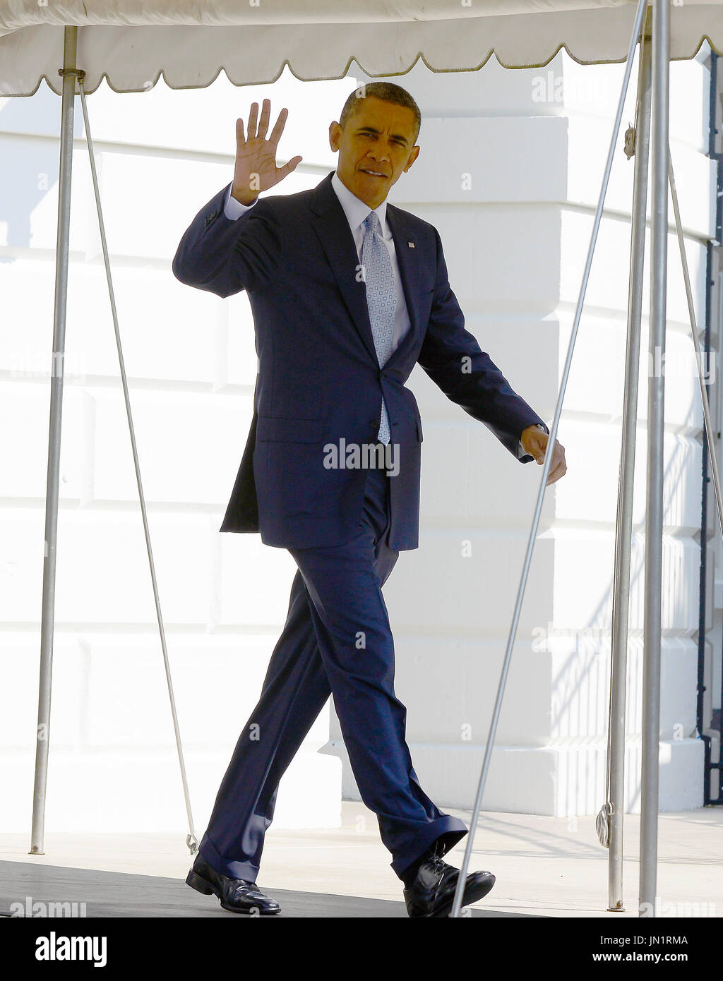 United States President Barack Obama waves to the photographers as he departs the White House in Washington, D.C. for Henderson, Nevada on Sunday, September 30, 2012..Credit: Ron Sachs / Pool via CNP Stock Photo