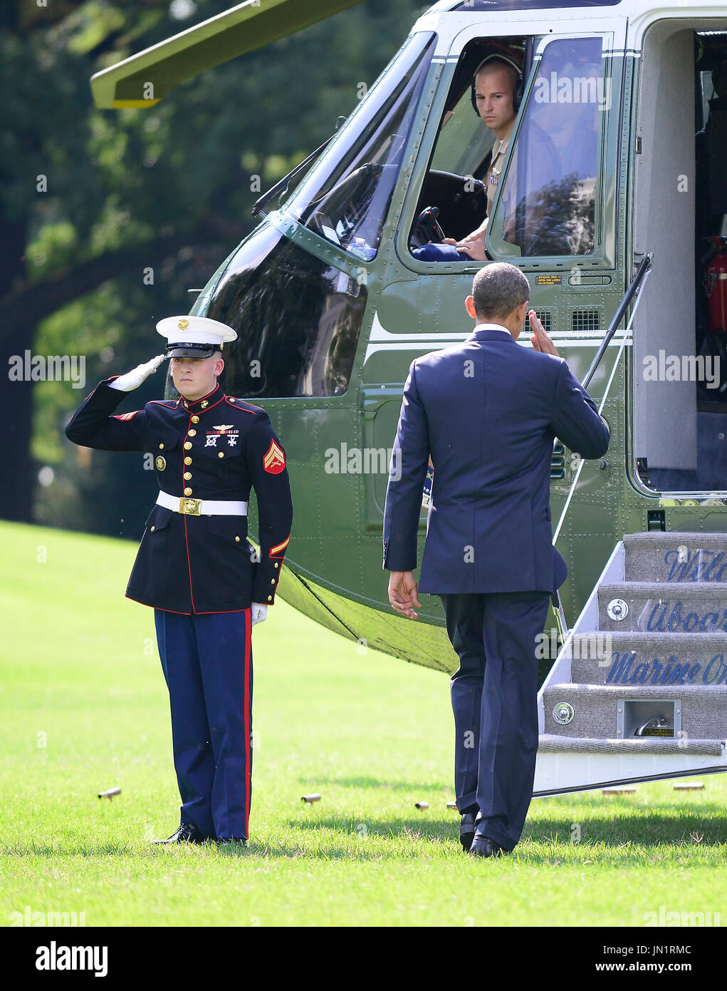 United States President Barack Obama salutes the Marine Guard as he boards Marine One to depart the White House in Washington, D.C. for Henderson, Nevada on Sunday, September 30, 2012..Credit: Ron Sachs / Pool via CNP Stock Photo