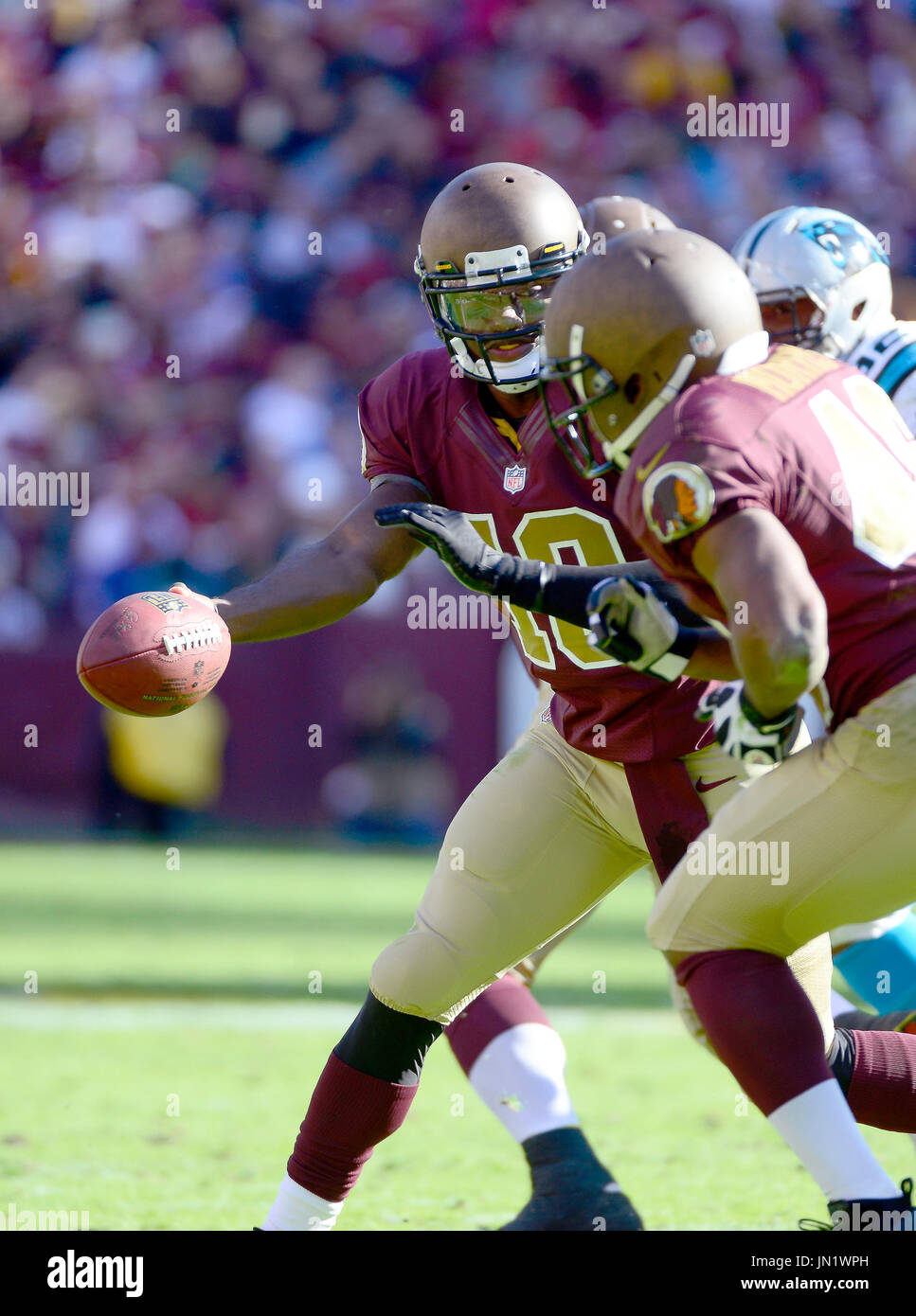 Washington Redskins quarterback Robert Griffin III (10) fakes a hand