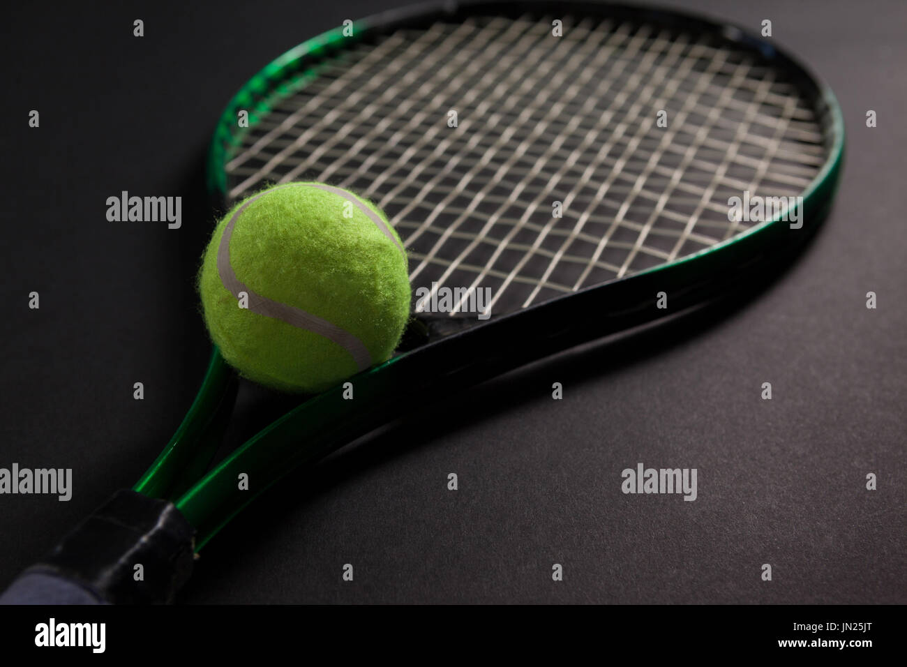 Premium Photo  Close up of tennis ball on string or net of tennis racquet  for exercise and hobby