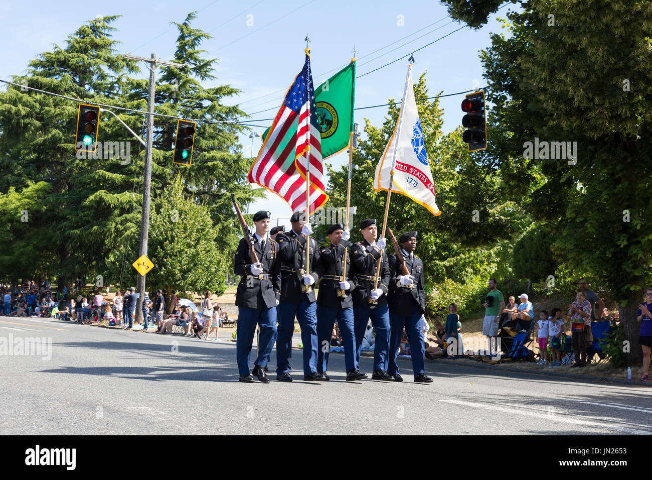 Seattle, Washington Joint Armed Forces Color Guard leads the West