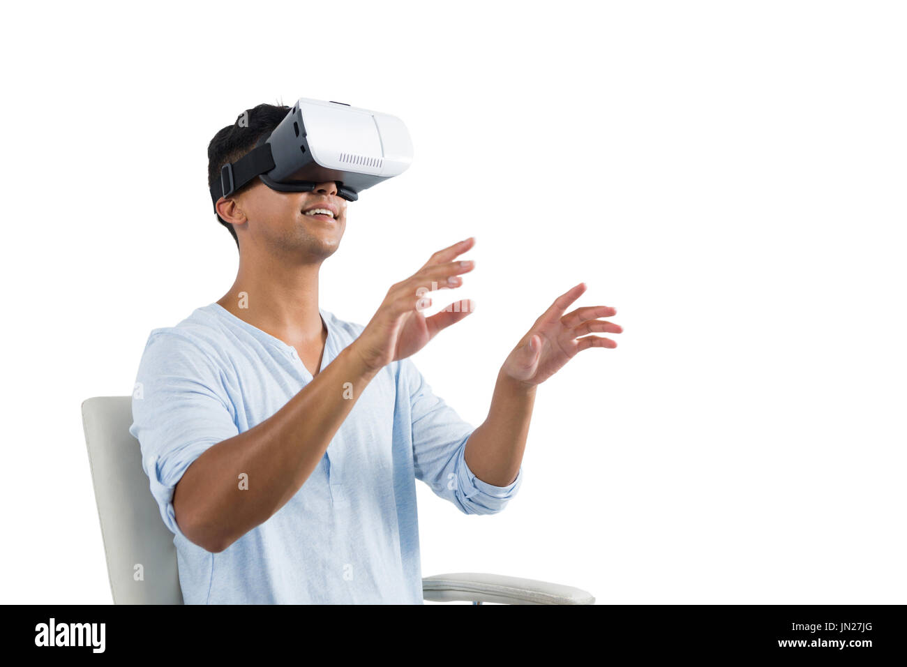 Human Using Virtual Headset Man using virtual reality headset against white background Stock Photo ...