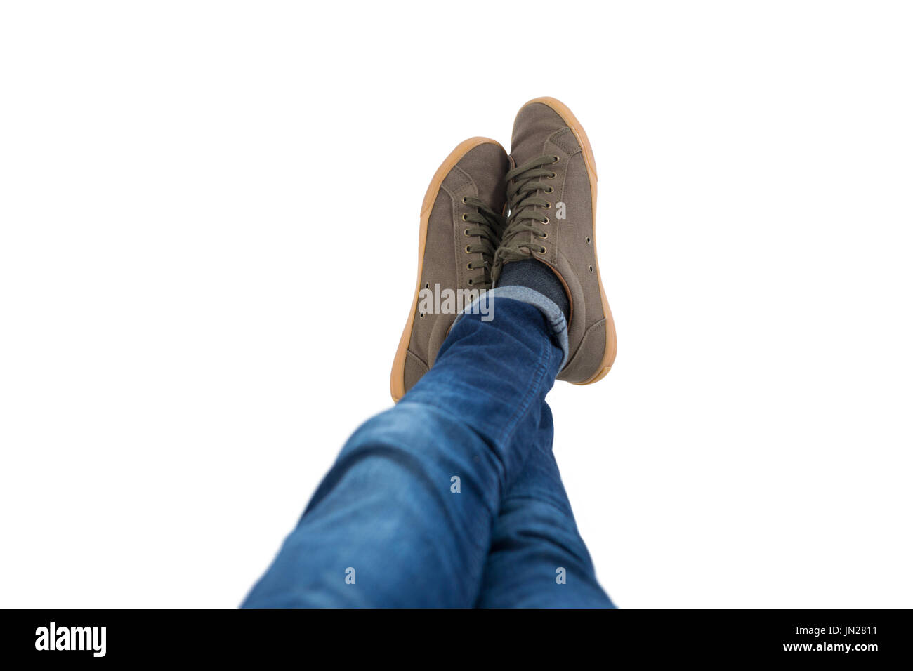 Boy legs crossed hi-res stock photography and images - Alamy